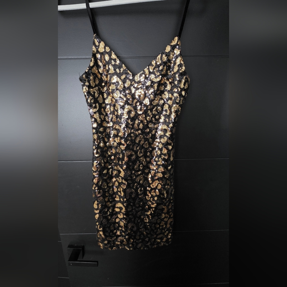 G BY Guess -Elegant Black and Gold Sequin Dress